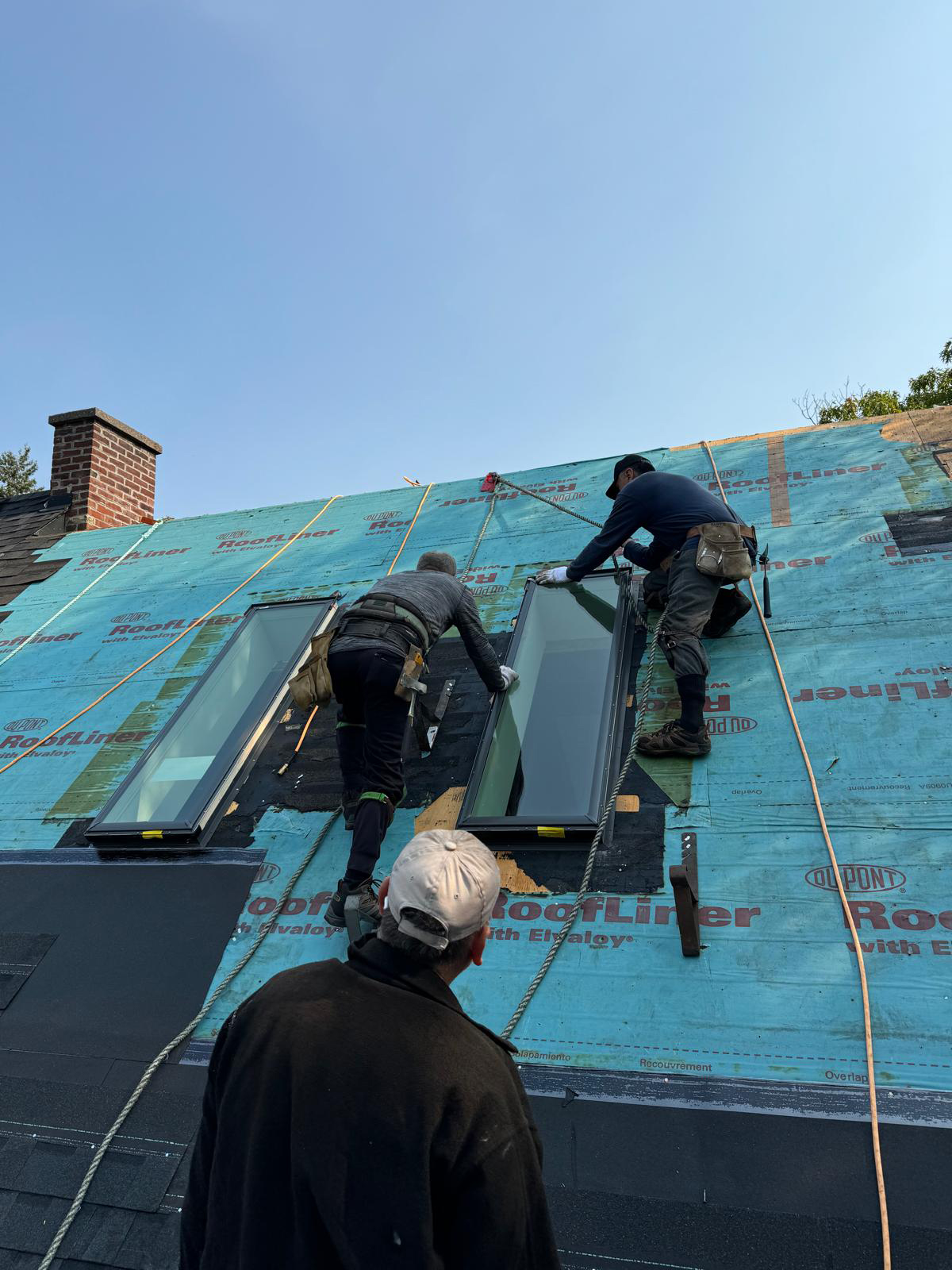 Well Roofing crew installing VELUX skylights on a residential roof in the GTA